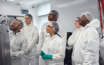 Students receive cleanroom training as participants in the Research Experiences for Undergraduates program at Boston University
